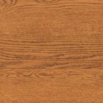 Gunstock wood stain on oak flooring with reddish-brown tones