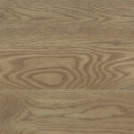 Cherry stain applied to oak flooring with warm red undertones